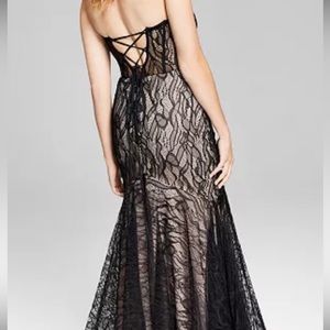 Strapless black beaded lace with tan lining. Never worn.